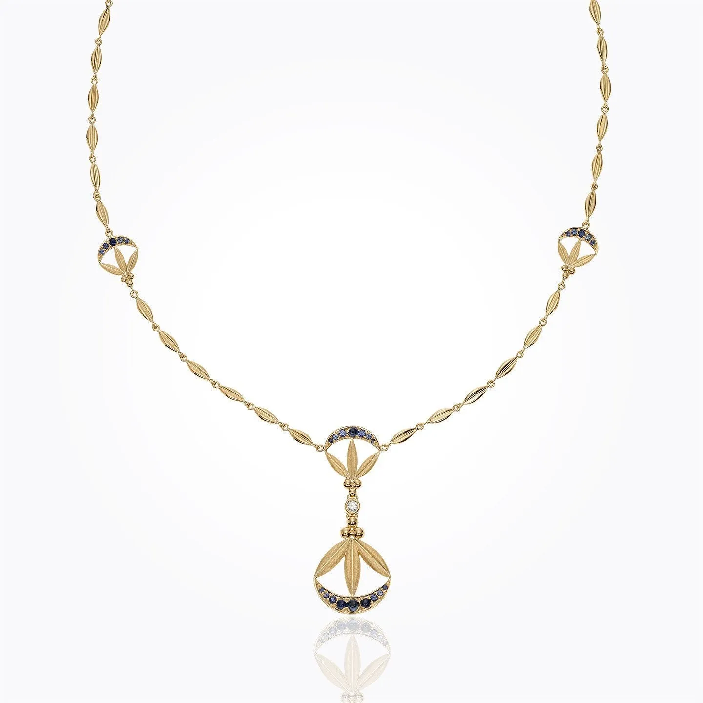 18K Lotus Cresent Necklace in blue sapphire and diamond