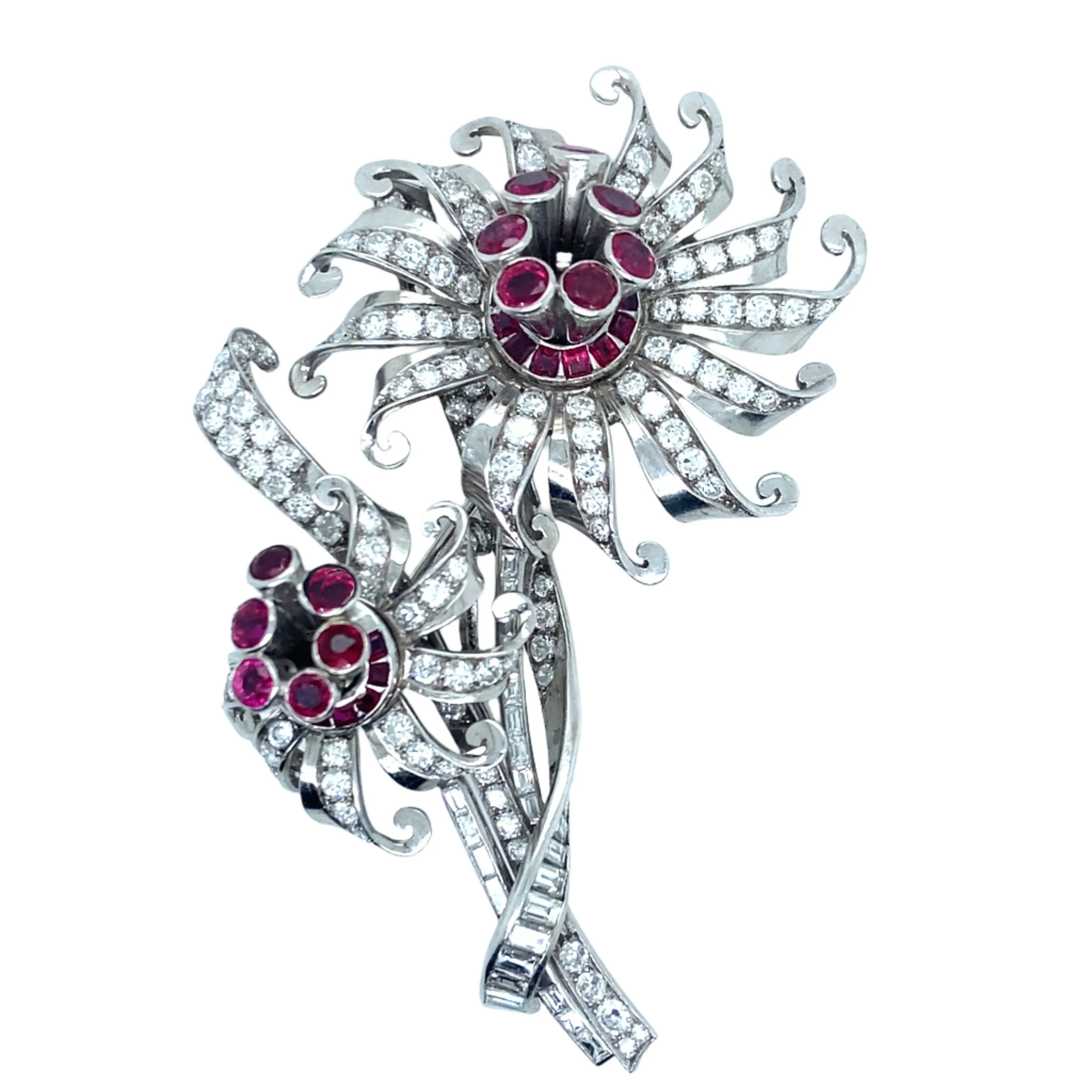 A platinum diamond and ruby brooch depicting two flowers. 1940.