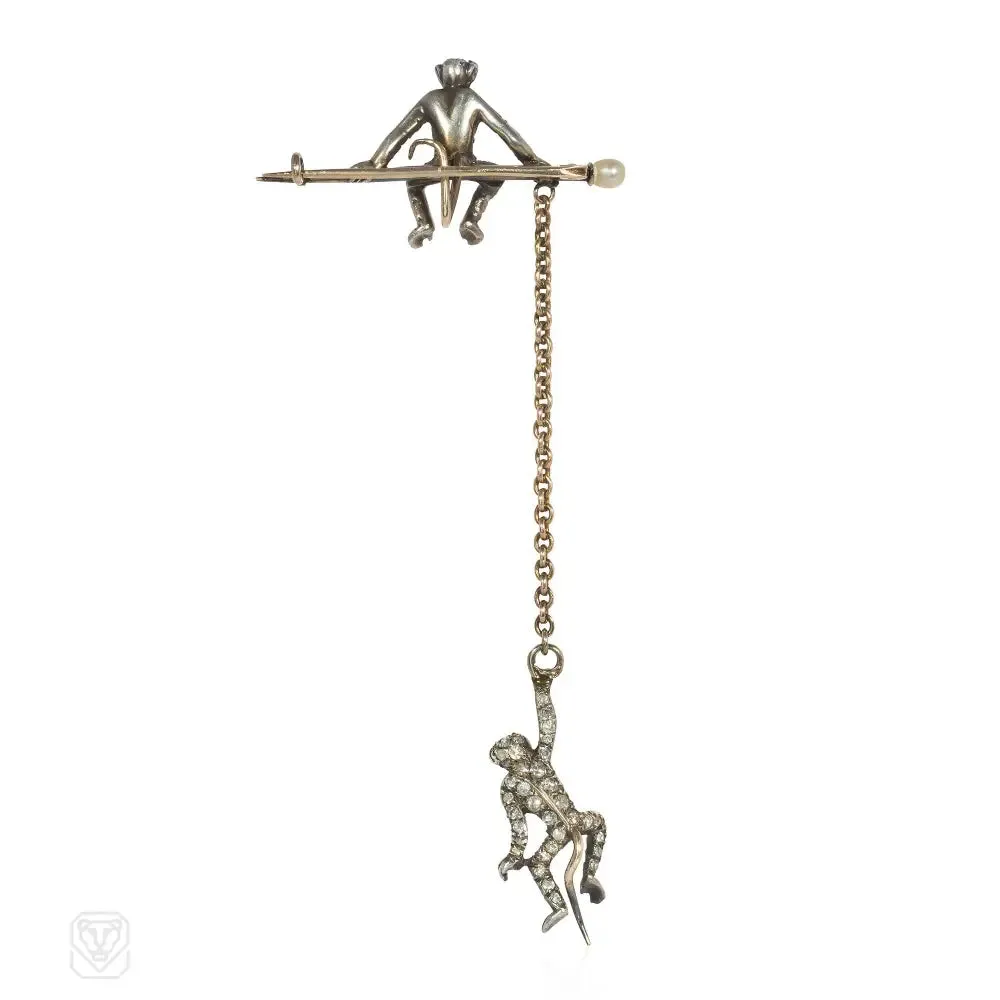 Antique diamond monkey brooch