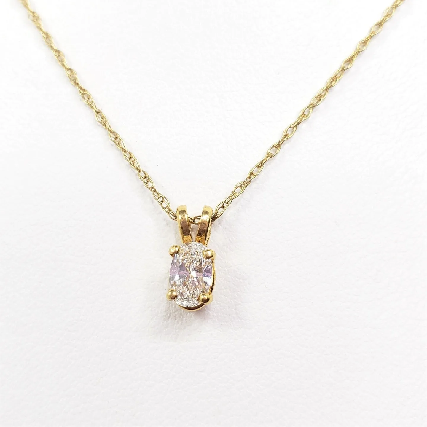 OVAL DIAMOND YELLOW GOLD PENDANT