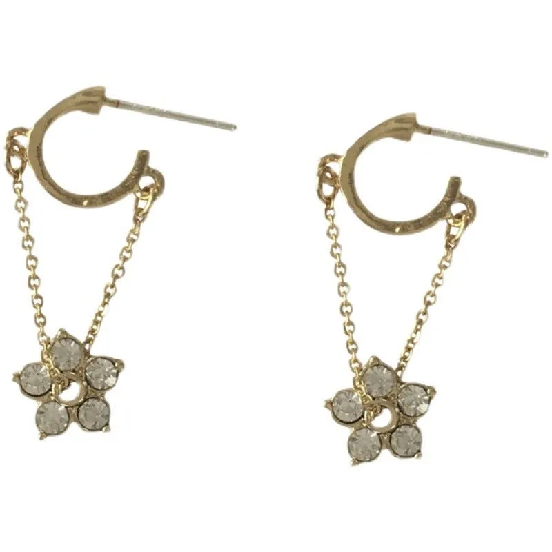 Petite Flower Charms Dangling from Gold Hoop Earrings